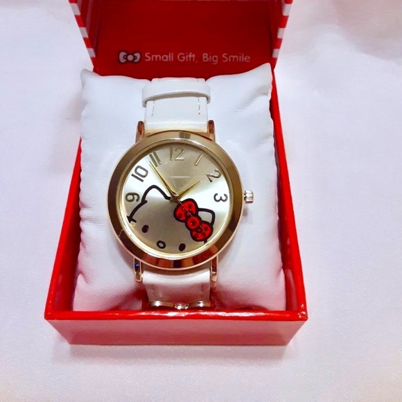 Hello Kitty Jewelry - New in Box Hello Kitty Watch White Band Gold Tone Trim